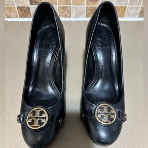Black leather Tory Burch shoes.